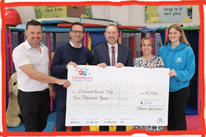 Steven and Carter support the Children's Respite Trust with £2000 donation