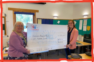 Buxted WI present CRT with a cheque for £800